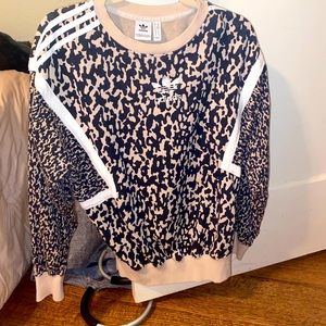 Adidas cheetah sweater.